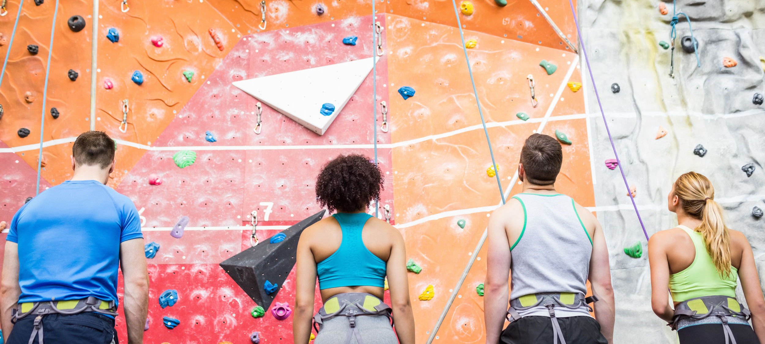 Group of Rock climbers looking at a mountain they are about to climb